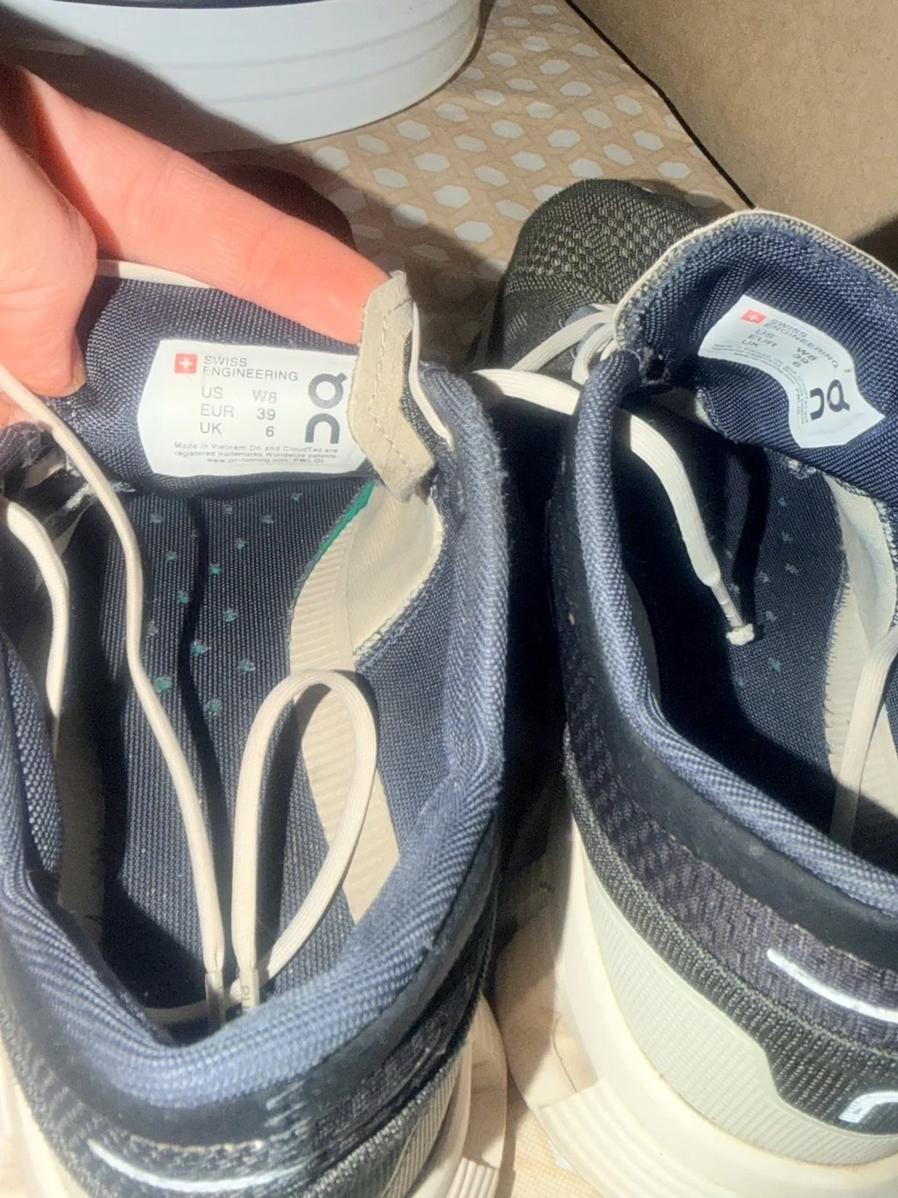 On Cloud Running Womens Sneakers in Black and Cream